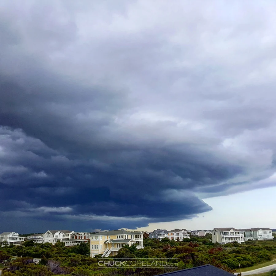 Large shelf cloud advancing over homes at Holden Beach, North Carolina